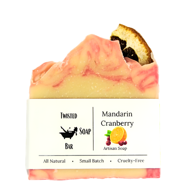 Single bar of Mandarin and Cranberry Soap with vibrant orange and red swirls, made with sea water, shea butter, rapeseed oil, and coconut oil.