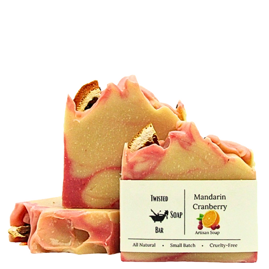Handcrafted Mandarin and Cranberry Soap bar with vibrant orange and red swirls, made with sea water, shea butter, rapeseed oil, and coconut oil
