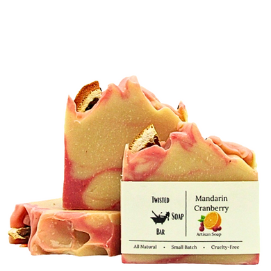 Handcrafted Mandarin and Cranberry Soap bar with vibrant orange and red swirls, made with sea water, shea butter, rapeseed oil, and coconut oil