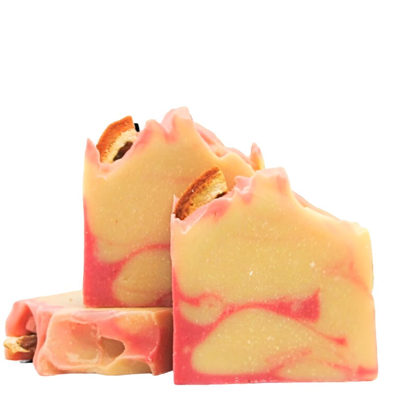 Three bars of unlabeled Mandarin and Cranberry Soap with vibrant orange and red swirls, made with sea water, shea butter, rapeseed oil, and coconut oil, placed on a clean white background